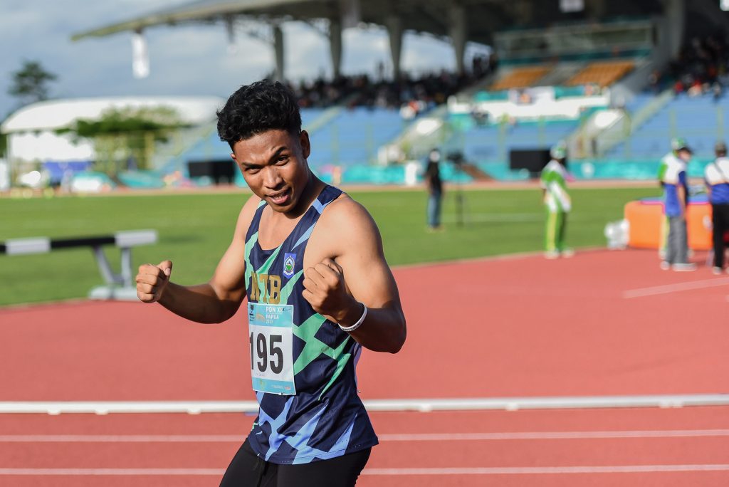 Sprinter Nusa Tenggara Barat Lalu Mohammad Zohri (195) seusai mengikuti final lari 100 meter putri PON XX Papua di Stadion Atletik, Mimika SPort Complex. (Foto : PB PON Papua / Rommy Pujianto),