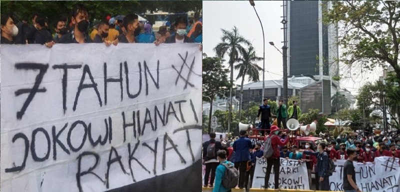 Hujan tidak menghalangi para mahasiswa yang dimotori BEM-SI melakukan unjuk rasa 7 Tahun Pemerintahan Jokowi di Istana Negara, Jakarta, Kamis (21/10/21)