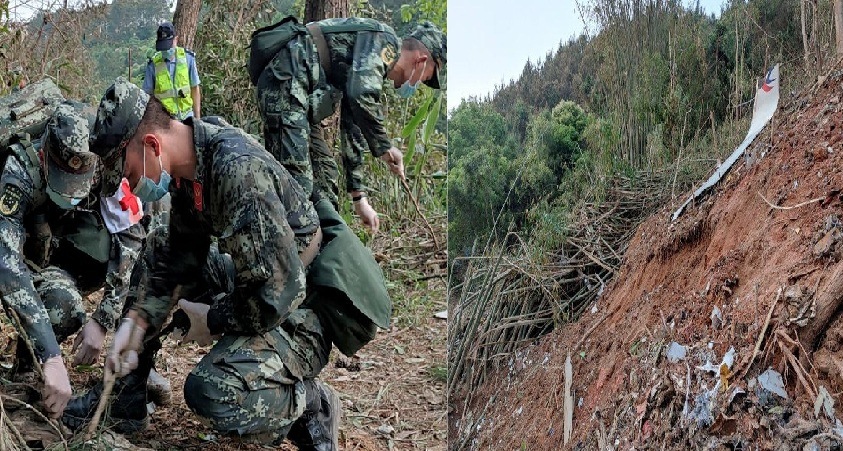 Tentara mencari di lereng bukit berhutan dan puing-puing pesawat terlihat di lokasi jatuhnya pesawat China Eastern Airlines Boeing 737-800