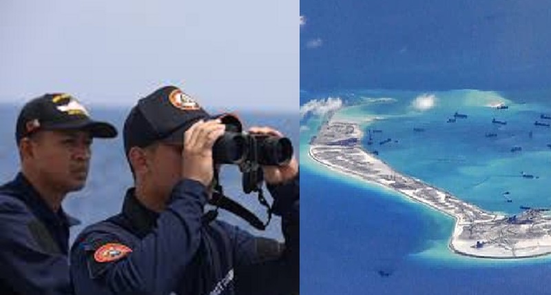 Personil penjaga pantai Filipina memantau aktivitas reklamasi China membangun pulau kecil di wilayah yang disengketakan di Laut China Selatan